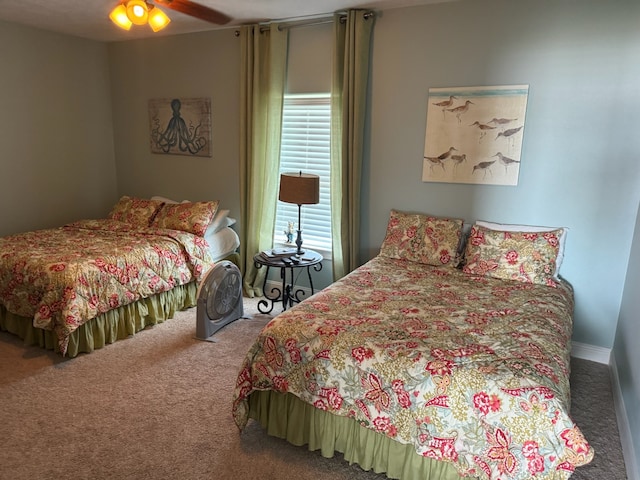 bedroom featuring ceiling fan and carpet floors