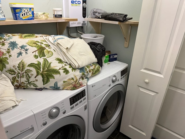 clothes washing area featuring separate washer and dryer