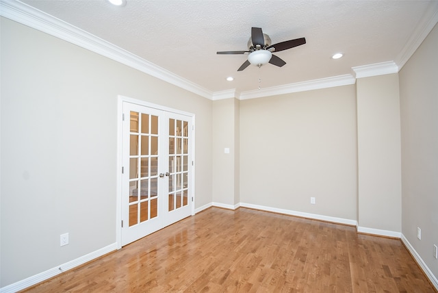 unfurnished room featuring ceiling fan, french doors, a textured ceiling, crown molding, and light hardwood / wood-style floors