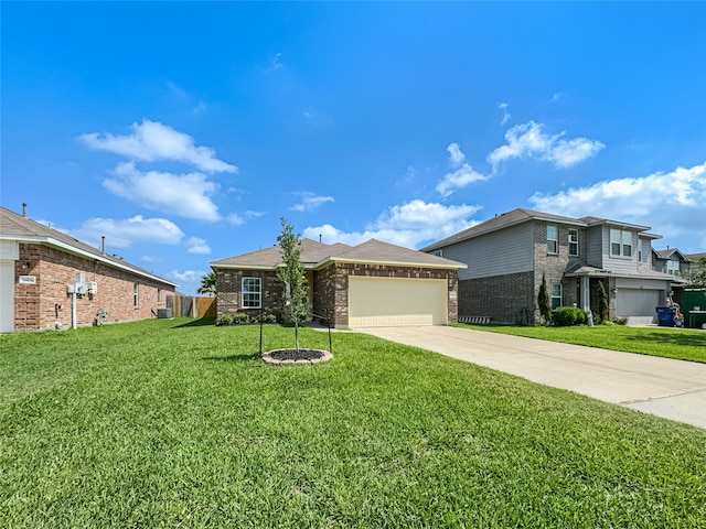 view of front of house featuring a garage, a front lawn, and central AC unit