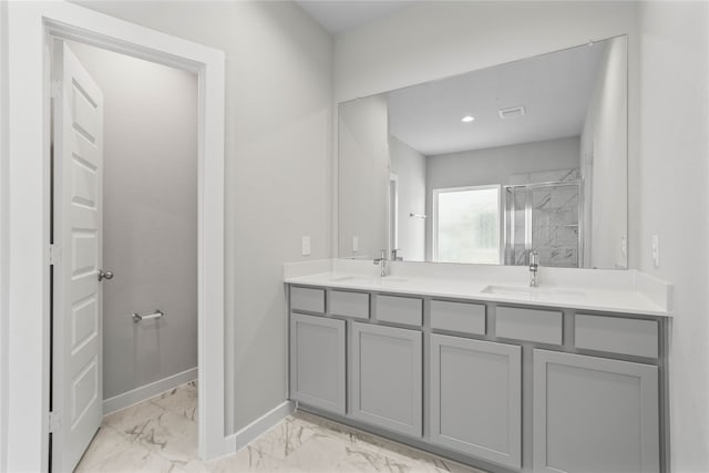 bathroom featuring walk in shower and vanity