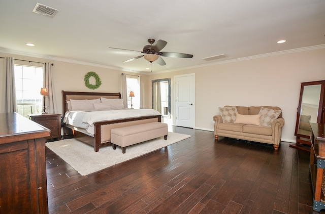 bedroom with ornamental molding, ceiling fan, and dark hardwood / wood-style flooring