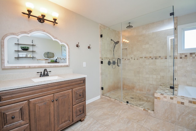 bathroom featuring walk in shower, vanity, and tile floors