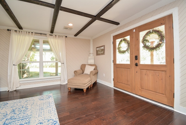 foyer featuring beam ceiling, french doors, and dark wood-type flooring