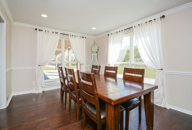 dining space featuring plenty of natural light, ornamental molding, and dark wood-type flooring