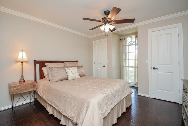 bedroom with ceiling fan, multiple windows, and dark wood-type flooring