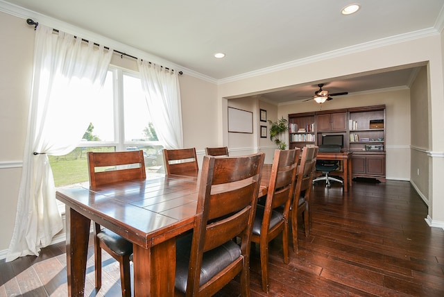 dining space with dark hardwood / wood-style floors, ceiling fan, and crown molding