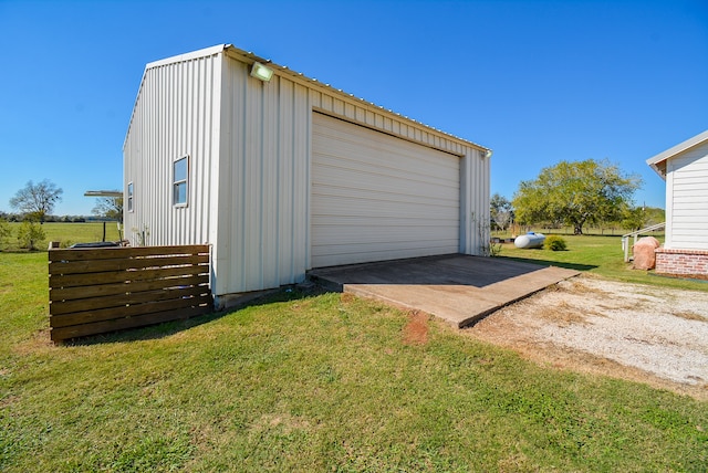 garage with a yard