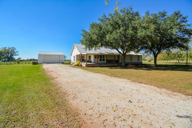 view of front of home featuring a front yard and covered porch