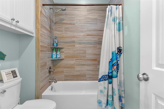 bathroom featuring shower / tub combo with curtain and toilet