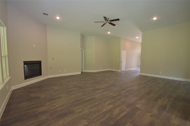 unfurnished living room featuring ceiling fan and dark hardwood / wood-style floors