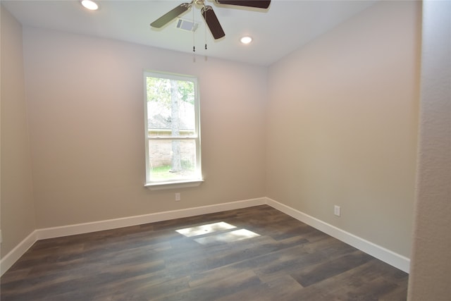 empty room with ceiling fan and hardwood / wood-style floors