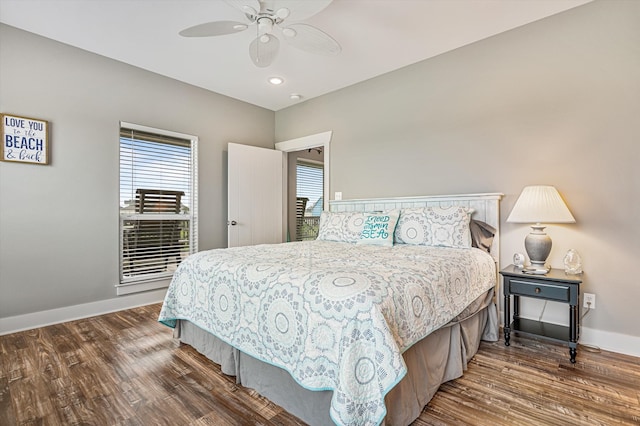 bedroom featuring ceiling fan and hardwood / wood-style flooring