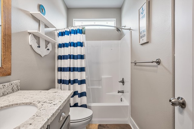 full bathroom with tile flooring, vanity, toilet, and shower / bath combo with shower curtain