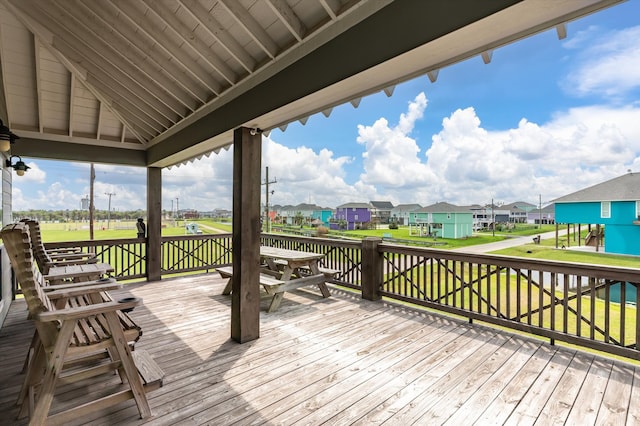 deck featuring a lawn