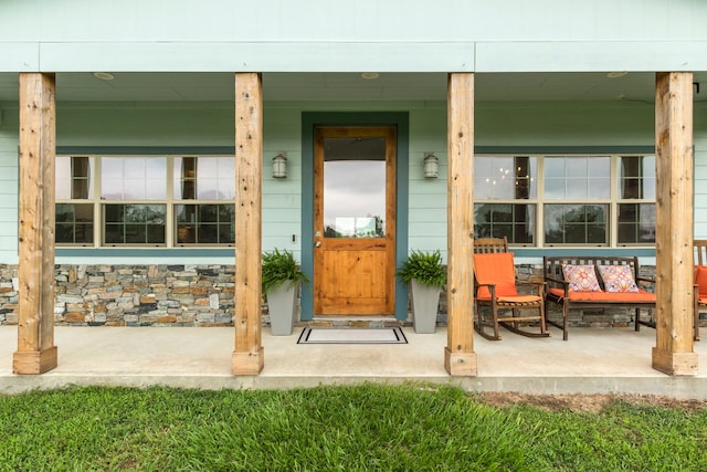 property entrance with a porch