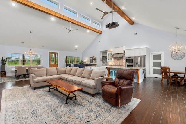 living room featuring ceiling fan with notable chandelier, dark hardwood / wood-style floors, beam ceiling, and high vaulted ceiling