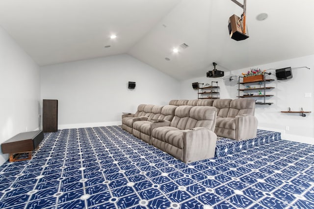 cinema featuring carpet floors and lofted ceiling