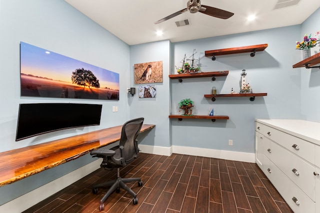 office space with ceiling fan and dark wood-type flooring