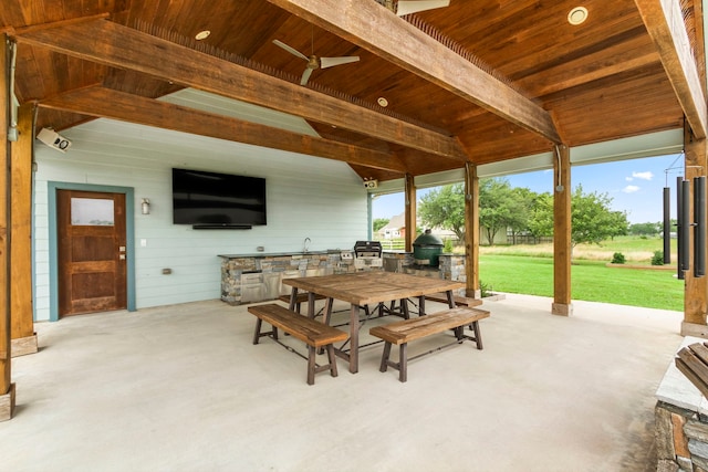 view of patio / terrace featuring area for grilling and ceiling fan