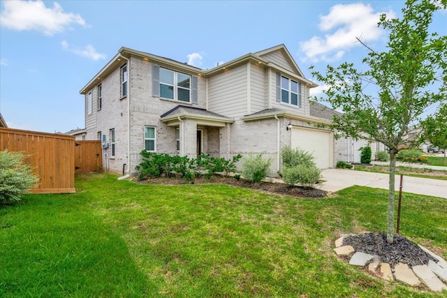 view of front property featuring a garage and a front lawn