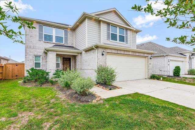 view of front of house featuring a front lawn and a garage