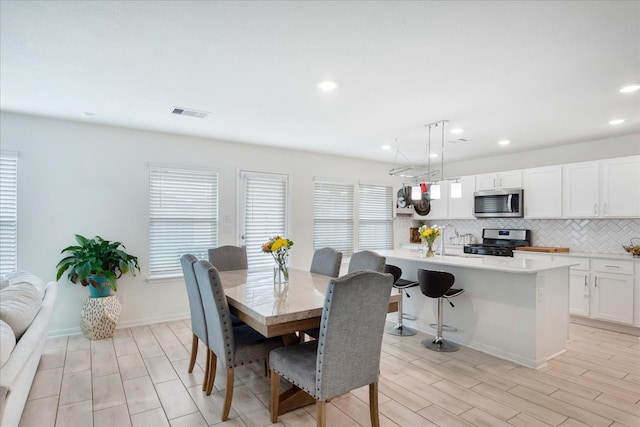 dining area featuring light hardwood / wood-style flooring