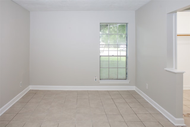 view of tiled empty room