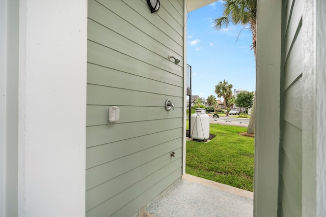 property entrance with a yard