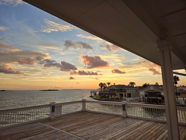 deck featuring a water view