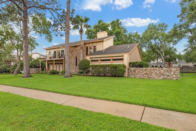 view of front of house with a front lawn