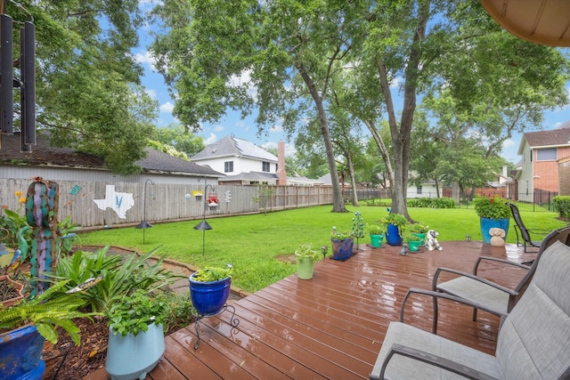 deck featuring a lawn