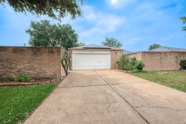 garage with a yard