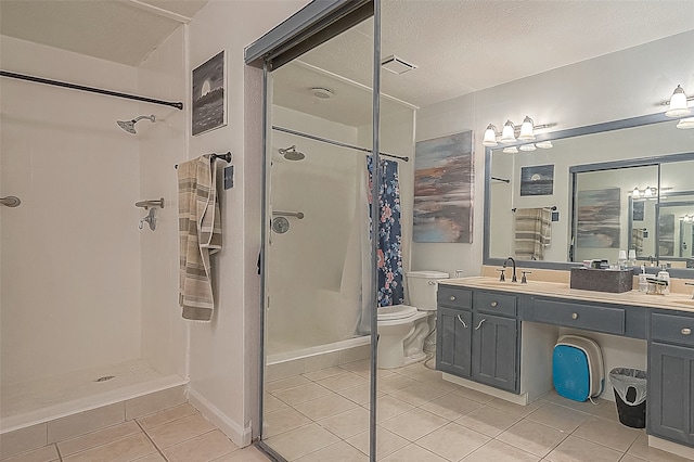 bathroom with tile floors, double sink vanity, a shower with shower curtain, and toilet