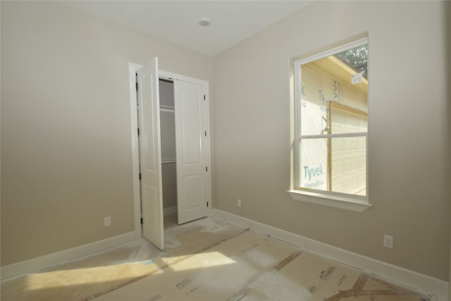 unfurnished bedroom featuring a closet