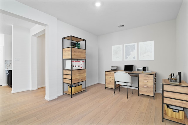 office area featuring light wood-type flooring