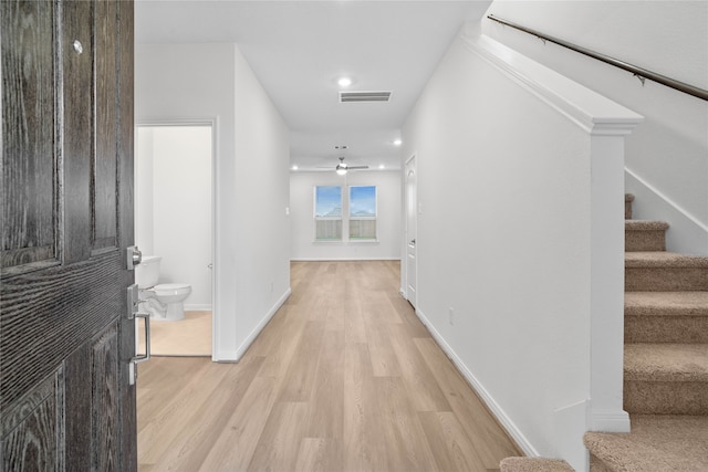 hallway featuring light hardwood / wood-style flooring