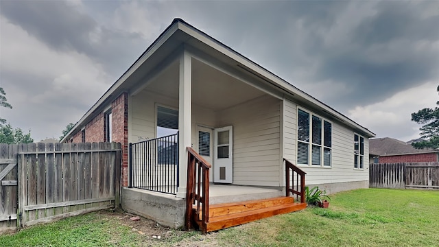 exterior space with a lawn