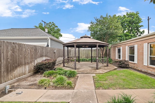 view of yard featuring a patio and a gazebo