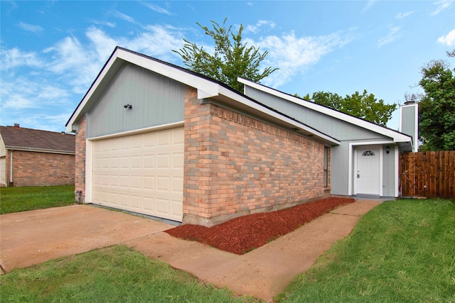 garage with a lawn