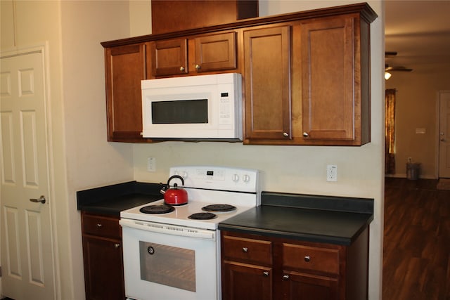 kitchen with ceiling fan and white appliances