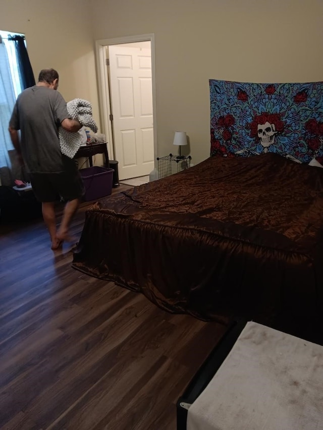 bedroom featuring hardwood / wood-style flooring and billiards