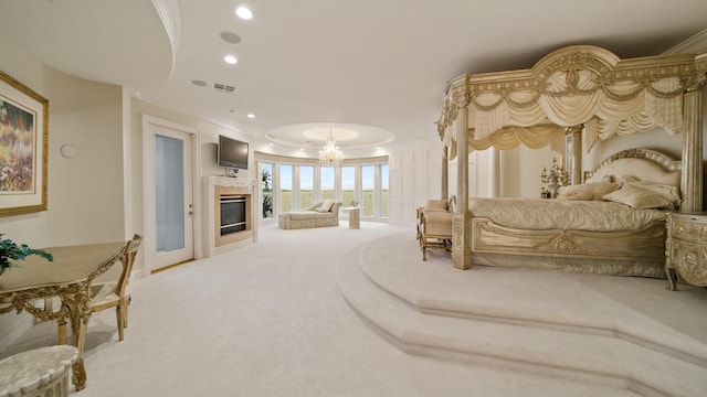 bedroom featuring ornamental molding, carpet, access to outside, and a notable chandelier