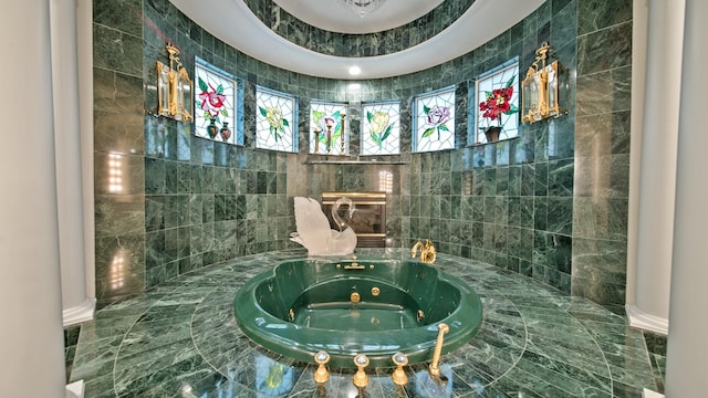 bathroom with a whirlpool tub