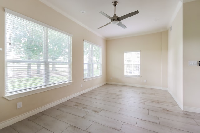 unfurnished room with ceiling fan and ornamental molding