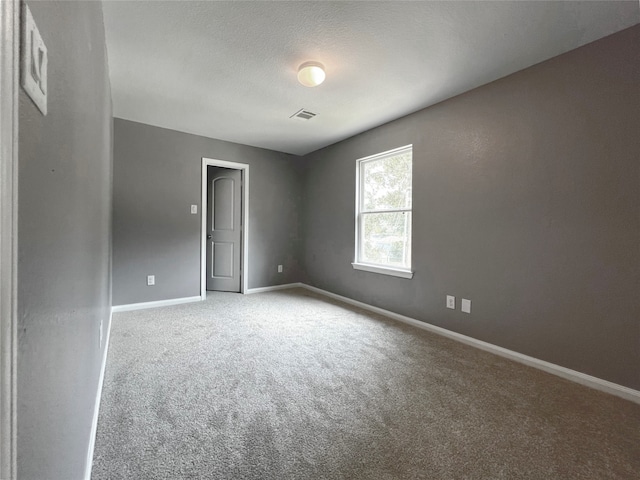 spare room with carpet flooring