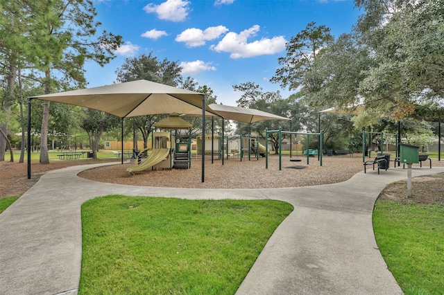 view of jungle gym with a lawn