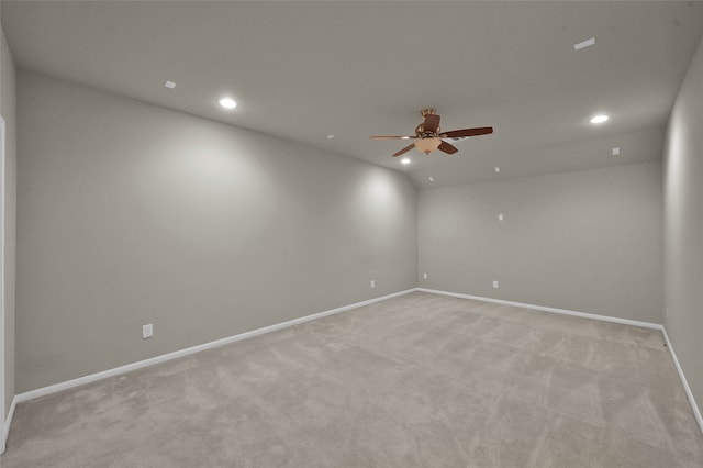 spare room with carpet flooring and ceiling fan