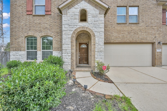 view of front of home with a garage