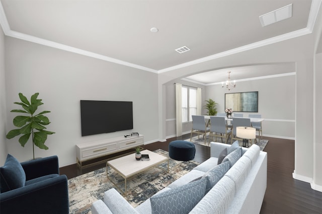 living room with crown molding, a chandelier, and dark wood-type flooring